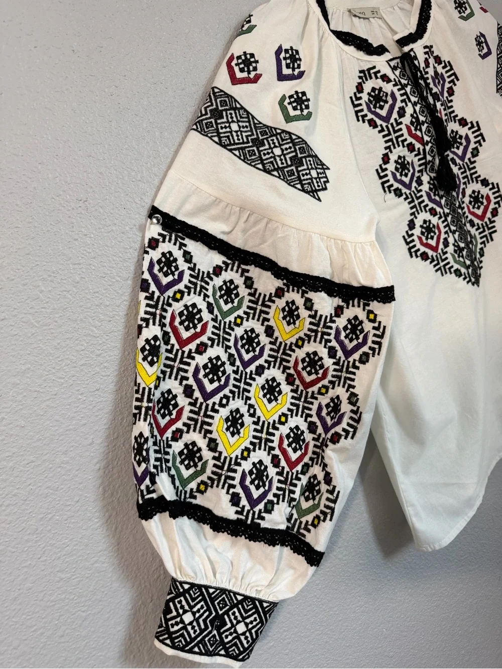 Embroidered White Peasant Blouse with Multicolor Accents - Picture 2 of 9